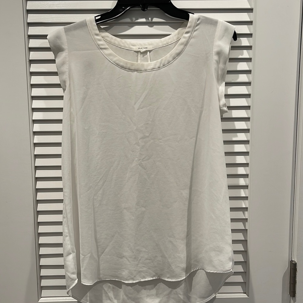 White hi-lo babydoll style blouse